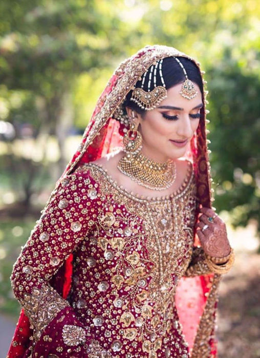 Picture of Saliha Ayub In A Scarlet Ensemble Accentuated With Intricate Zardozi