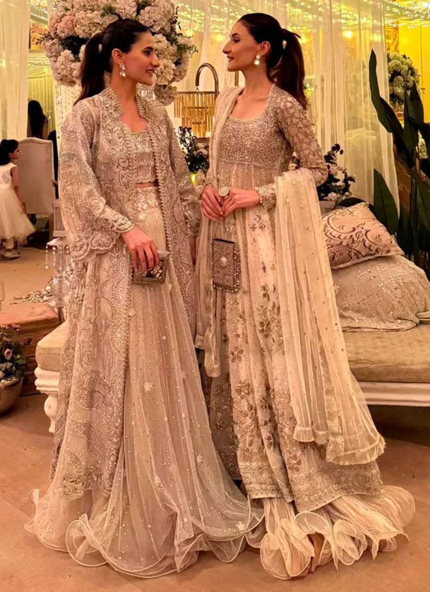 Umara And Kashaf In Sublime Ivory Ensembles